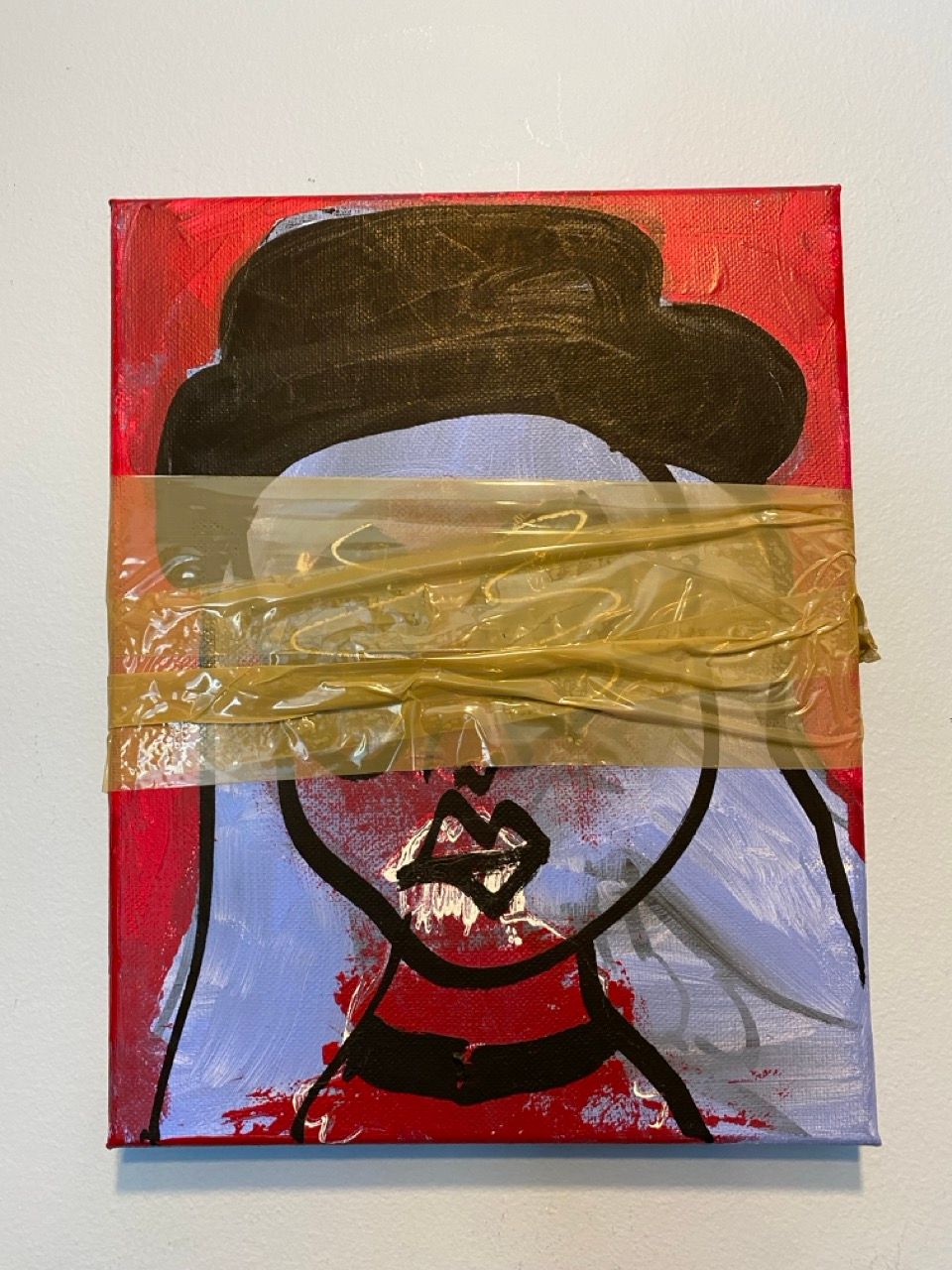 painting of figure with eyes covered by tape
