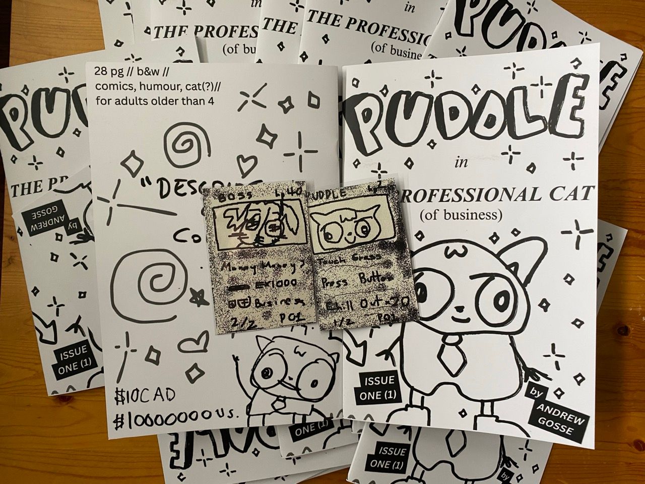 stack of "Puddle" comic books